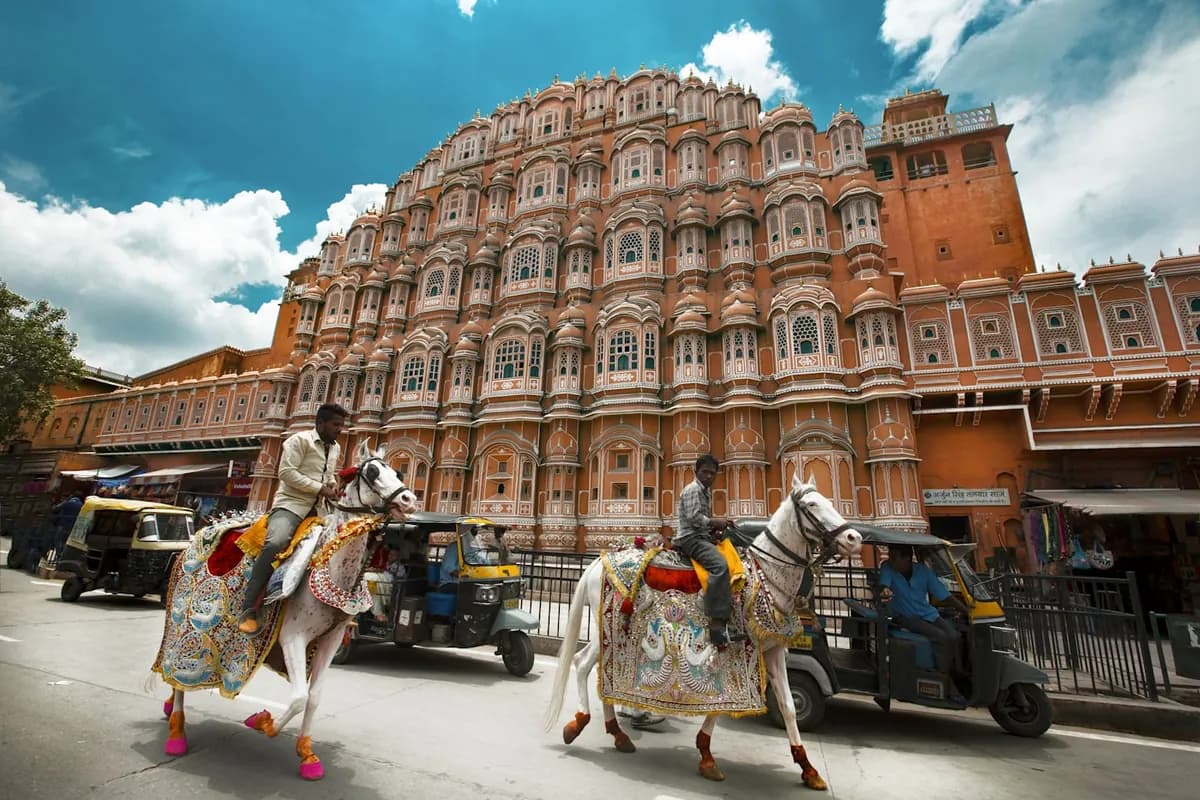 Hawa Mahal, Jaipur, with autorickshaws on the street below
