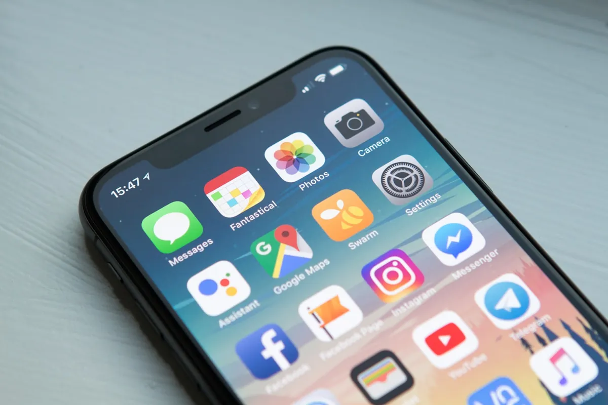 Phone showing maps and social apps on a home screen